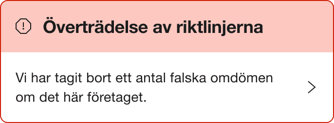 A Red warning alert banner that says "Breach of guidelines. We've removed a number of fake reviews for this company."